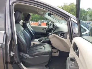 2023 Chrysler Pacifica Touring L with VIN 2C4RC1BG6PR612749, listed as a IAAI auction lot 42612932 with 69,931 mi miles and . Bid and sale history available at DreamBid. Image 5.