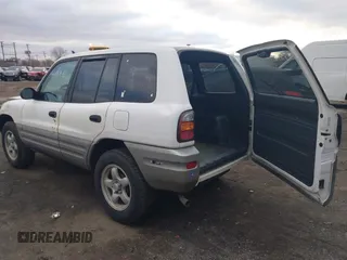 1998 Toyota RAV4 with VIN JT3GP10V9W7031439, listed as a IAAI auction lot 41489043 with 127,726 mi miles and . Bid and sale history available at DreamBid. Image 3.