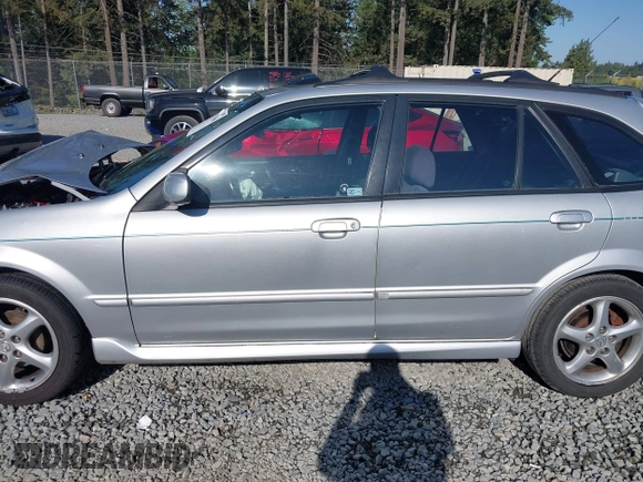 2002 Mazda Protege z VIN JM1BJ246221493337, wystawiony jako IAAI lot #42171966 z przebiegiem 244 609 mil mil oraz . Historia ofert i sprzedaży dostępna na DreamBid. Obrazek 14.