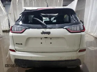 2019 Jeep Cherokee High Altitude z VIN 1C4PJMDXXKD418412, wystawiony jako Copart lot #42813455 z przebiegiem 42 376 mil mil oraz Szkoda całkowita • Salvage title. Historia ofert i sprzedaży dostępna na DreamBid. Obrazek 6.
