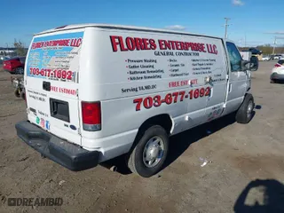 2011 Ford Econoline Cargo Van Recreational with VIN 1FTNE2EW6BDA44841, listed as a IAAI auction lot 40803565 with 268,523 mi miles. Bid and sale history available at carsss.com. Image 4.