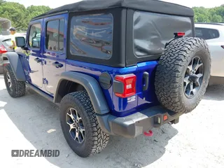 2018 Jeep Wrangler Unlimited Rubicon with VIN 1C4HJXFG8JW184793, listed as a IAAI auction lot 42429098 with 86,580 mi miles and . Bid and sale history available at DreamBid. Image 3.