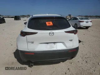 2021 Mazda CX-30 Premium z VIN 3MVDMBDYXMM308490, wystawiony jako Copart lot #49527905 z przebiegiem Nie podano mil oraz Szkoda całkowita • Salvage title. Historia ofert i sprzedaży dostępna na DreamBid. Obrazek 6.