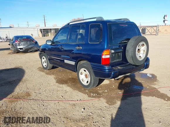 2003 Suzuki Vitara z VIN 2S3TE52V436101091, wystawiony jako IAAI lot #41472279 z przebiegiem 163 429 mil mil oraz . Historia ofert i sprzedaży dostępna na DreamBid. Obrazek 3.
