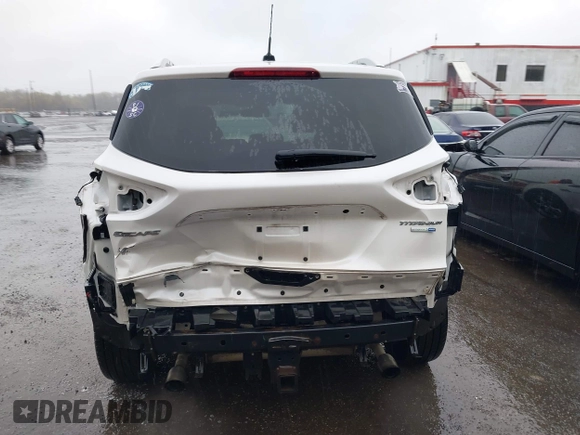 2014 Ford Escape Titanium with VIN 1FMCU9J94EUD49614, listed as a IAAI auction lot 42005864 with 87,779 mi miles. Bid and sale history available at carsss.com. Image 16.