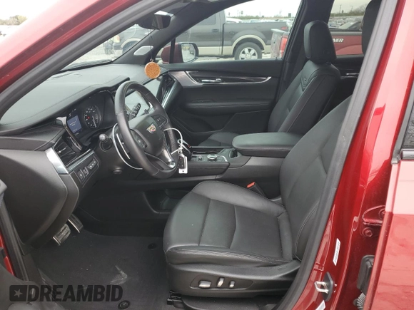 2023 Cadillac XT6 AWD Sport z VIN 1GYKPGRS5PZ221207, wystawiony jako Copart lot #41876425 z przebiegiem 23 193 mil mil oraz Szkody całkowita. Historia ofert i sprzedaży dostępna na DreamBid. Obrazek 7.