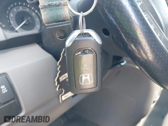 2014 Honda Odyssey Touring with VIN 5FNRL5H90EB082691, listed as a IAAI auction lot 42572977 with 54,413 mi miles and . Bid and sale history available at DreamBid. Image 11.