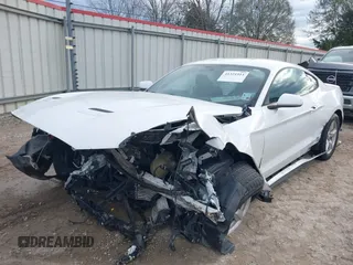 2018 Ford Mustang EcoBoost with VIN 1FA6P8TH2J5137411, listed as a IAAI auction lot 41321511 with 67,020 mi miles and . Bid and sale history available at carsss.com. Image 6.