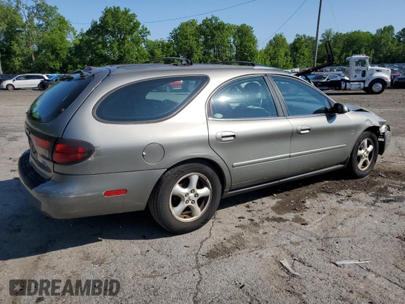 2004 Ford Taurus SE with VIN 1FAFP58S44A108250, listed as a Copart auction lot 58520615 with 119,575 mi miles and Salvage title. Bid and sale history available at DreamBid. Image 3.