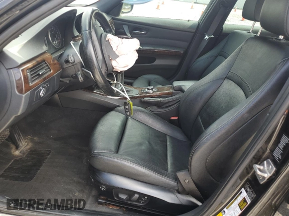 2011 BMW 3 Series 328i xDrive with VIN WBAPK5G50BNN31032, listed as a Copart auction lot 63237195 with 138,197 mi miles and Salvage title. Bid and sale history available at DreamBid. Image 7.