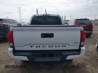 2018 Toyota Tacoma SR5 with VIN 3TMDZ5BN9JM051105, listed as a IAAI auction lot 41708034 with 98,000 mi miles and . Bid and sale history available at DreamBid. Image 16.