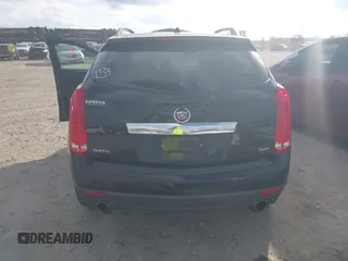2014 Cadillac SRX z VIN 3GYFNAE35ES652370, wystawiony jako IAAI lot #40984924 z przebiegiem 211 588 mil mil oraz . Historia ofert i sprzedaży dostępna na DreamBid. Obrazek 6.