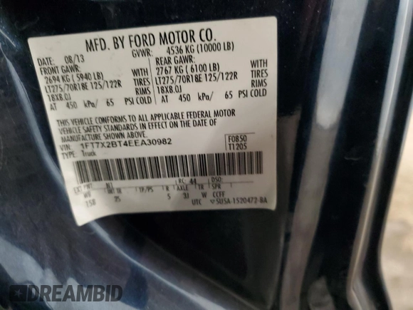 2014 Ford F-250 XLT with VIN 1FT7X2BT4EEA30982, listed as a Copart auction lot 77972454 with 261,755 mi miles and Salvage title. Bid and sale history available at DreamBid. Image 12.