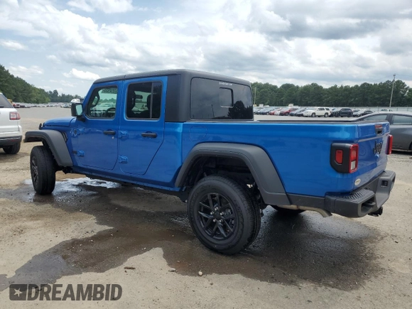 2023 Jeep Gladiator Sport S with VIN 1C6HJTAG3PL593284, listed as a Copart auction lot 57292935 with Not provided miles and Salvage title. Bid and sale history available at DreamBid. Image 2.