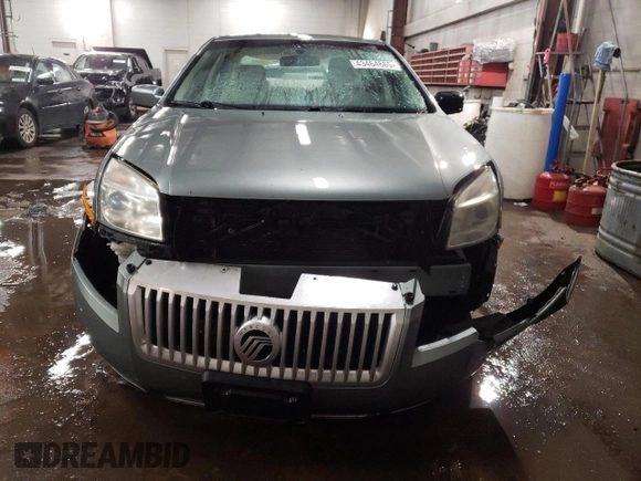 2006 Mercury Milan with VIN 3MEFM07Z06R655446, listed as a Copart auction lot 43464885 with 124,439 mi miles and Salvage title. Bid and sale history available at DreamBid. Image 5.