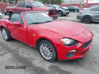 2018 FIAT 124 Spider Classica z VIN JC1NFAEK6J0137124, wystawiony jako IAAI lot #42056316 z przebiegiem 42 780 mil mil oraz . Historia ofert i sprzedaży dostępna na DreamBid. Obrazek 1.