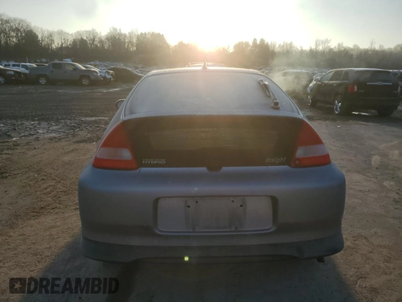 2000 Honda Insight z VIN JHMZE1371YT004249, wystawiony jako Copart lot #85041024 z przebiegiem 168 946 mil mil oraz Szkoda całkowita • Salvage title. Historia ofert i sprzedaży dostępna na DreamBid. Obrazek 6.