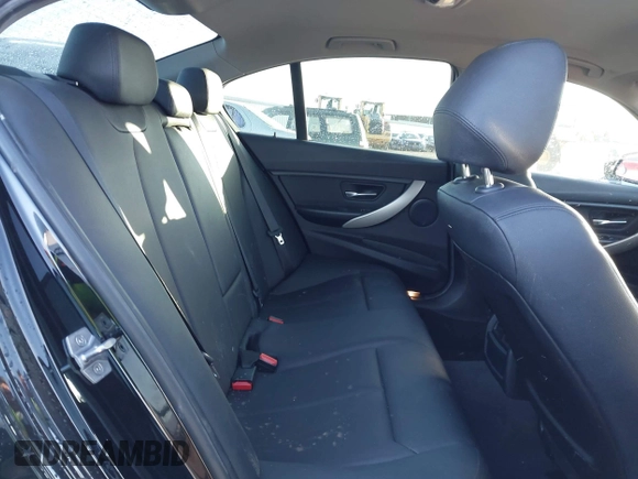 2016 BMW 3 Series 320i with VIN WBA8A9C55GK617241, listed as a IAAI auction lot 41781613 with 111,053 mi miles. Bid and sale history available at carsss.com. Image 7.