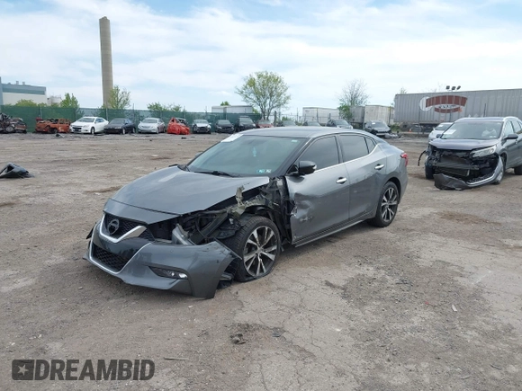 2018 Nissan Maxima SV with VIN 1N4AA6AP4JC377985, listed as a IAAI auction lot 42071678 with 104,326 mi miles and . Bid and sale history available at DreamBid. Image 2.