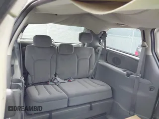 2005 Dodge Grand Caravan with VIN 2D8GP24R55R248418, listed as a IAAI auction lot 42147890 with Not Provided miles and . Bid and sale history available at DreamBid. Image 8.