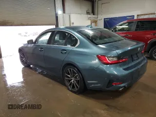2019 BMW 3 Series 330i with VIN WBA5R1C51KFH14244, listed as a Copart auction lot 52199945 with 45,365 mi miles and Salvage title. Bid and sale history available at DreamBid. Image 2.