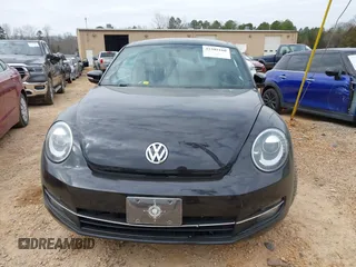 2012 Volkswagen Beetle 2.0T Turbo with VIN 3VW467AT9CM658495, listed as a IAAI auction lot 41505160 with 138,842 mi miles. Bid and sale history available at carsss.com. Image 13.