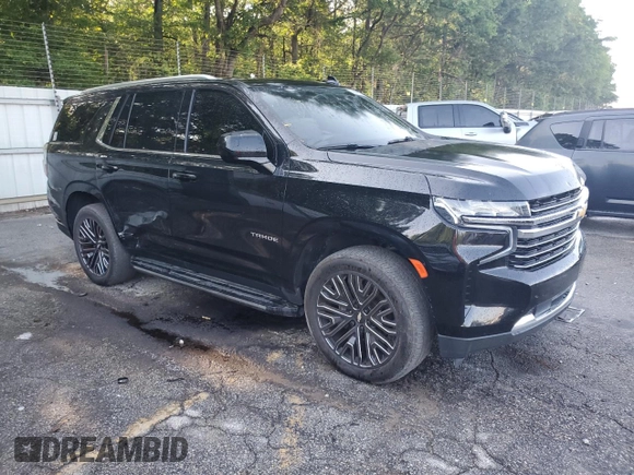 2021 Chevrolet Tahoe LT with VIN 1GNSCNKD8MR120313, listed as a Copart auction lot 56862875 with 125,040 mi miles and Clean title. Bid and sale history available at DreamBid. Image 4.