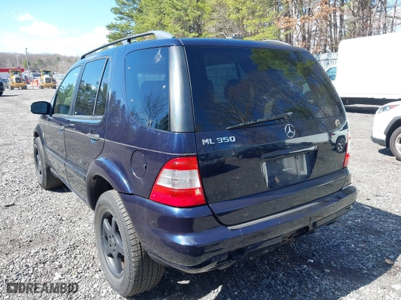 2003 Mercedes-Benz M-Class 3.7L with VIN 4JGAB57E03A418713, listed as a IAAI auction lot 41835875 with 195,982 mi miles. Bid and sale history available at carsss.com. Image 3.