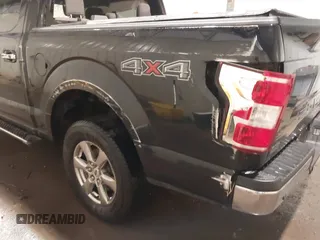 2018 Ford F-150 XL with VIN 1FTEW1EP1JKF22383, listed as a IAAI auction lot 42316339 with 113,052 mi miles and . Bid and sale history available at DreamBid. Image 13.