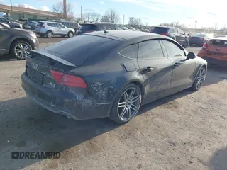 2014 Audi A7 3.0 Prestige with VIN WAU2GAFC6EN030266, listed as a IAAI auction lot 41439486 with 160,917 mi miles. Bid and sale history available at carsss.com. Image 4.