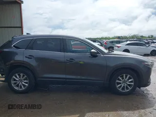 2016 Mazda CX-9 Sport with VIN JM3TCABY5G0122478, listed as a IAAI auction lot 42115795 with 134,980 mi miles and . Bid and sale history available at DreamBid. Image 13.