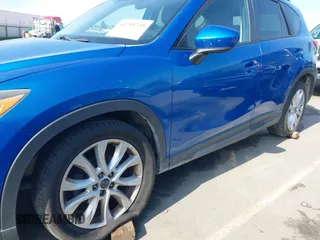 2014 Mazda CX-5 Grand Touring with VIN JM3KE4DY1E0327703, listed as a IAAI auction lot 41755735 with 206,845 mi miles. Bid and sale history available at carsss.com. Image 6.