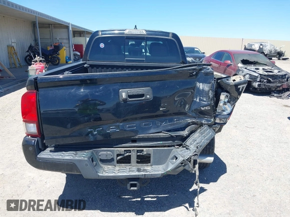 2018 Toyota Tacoma SR5 with VIN 3TMBZ5DN1JM014540, listed as a IAAI auction lot 42505324 with 112,990 mi miles and . Bid and sale history available at DreamBid. Image 16.