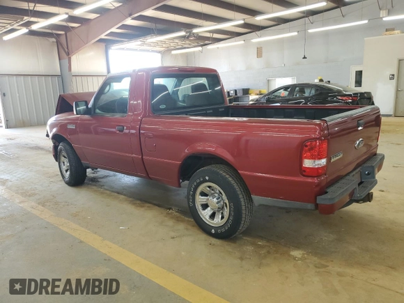 2009 Ford Ranger XL with VIN 1FTYR10D39PA15761, listed as a Copart auction lot 61823265 with 148,225 mi miles and Salvage title. Bid and sale history available at DreamBid. Image 2.