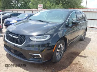 2023 Chrysler Pacifica Hybrid Touring L with VIN 2C4RC1L70PR622000, listed as a IAAI auction lot 42711826 with 65,109 mi miles and . Bid and sale history available at DreamBid. Image 18.