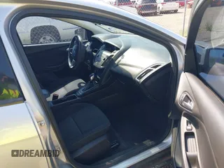 2018 Ford Focus SE z VIN 1FADP3FE0JL321530, wystawiony jako IAAI lot #42275532 z przebiegiem 65 412 mil mil oraz . Historia ofert i sprzedaży dostępna na DreamBid. Obrazek 5.