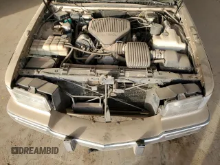 1994 Cadillac Fleetwood z VIN 1G6DW52P2RR716708, wystawiony jako Copart lot #86538194 z przebiegiem Nie podano mil oraz Czysty tytuł • Clean title. Historia ofert i sprzedaży dostępna na DreamBid. Obrazek 11.