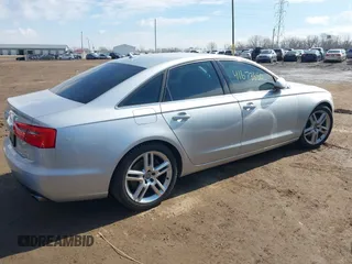 2015 Audi A6 2.0T Premium Plus with VIN WAUGFAFC2FN017718, listed as a IAAI auction lot 41673650 with 120,831 mi miles. Bid and sale history available at carsss.com. Image 4.