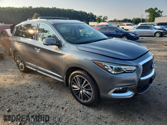2019 Infiniti QX60 Luxe with VIN 5N1DL0MMXKC522444, listed as a Copart auction lot 63564895 with 99,748 mi miles and Salvage title. Bid and sale history available at DreamBid. Image 4.