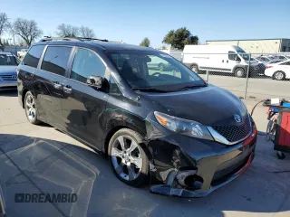 2014 Toyota Sienna SE with VIN 5TDXK3DC2ES482229, listed as a Copart auction lot 47080475 with 316,711 mi miles and Salvage Title. Bid and sale history available at DreamBid. Image 4.