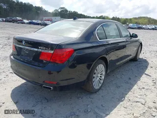 2010 BMW 7 Series 750Li with VIN WBAKB8C54ACY63650, listed as a IAAI auction lot 41961941 with 127,405 mi miles. Bid and sale history available at carsss.com. Image 4.