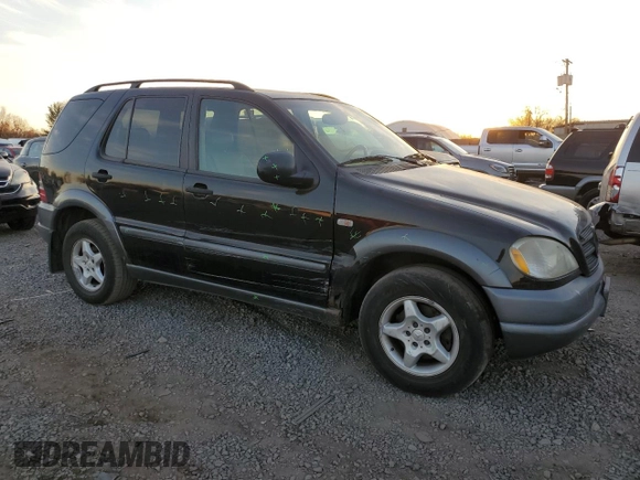 1999 Mercedes-Benz M-Class with VIN 4JGAB54E3XA092934, listed as a Copart auction lot 80631164 with 180,734 mi miles and Salvage Title. Bid and sale history available at carsss.com. Image 4.