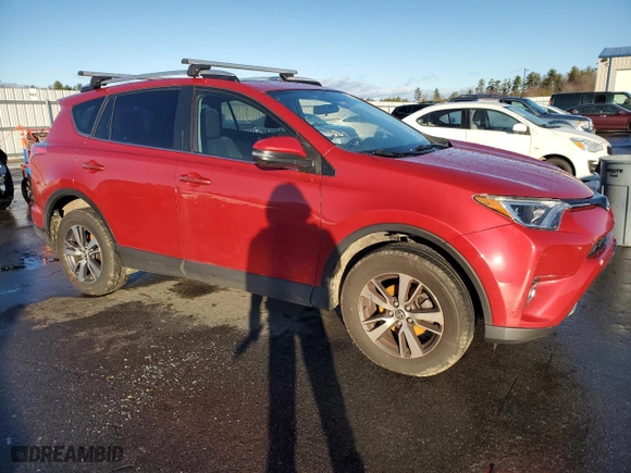 2016 Toyota RAV4 XLE with VIN JTMRFREV0GJ086087, listed as a Copart auction lot 83670964 with 83,045 mi miles and Salvage Title. Bid and sale history available at carsss.com. Image 4.