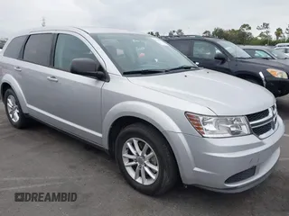 2014 Dodge Journey American Value with VIN 3C4PDCAB9ET102217, listed as a IAAI auction lot 42790415 with 190,940 mi miles and . Bid and sale history available at DreamBid. Image 1.