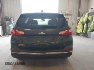 2018 Chevrolet Equinox LT z VIN 3GNAXJEV5JS569101, wystawiony jako IAAI lot #42055496 z przebiegiem 173 494 mil mil oraz . Historia ofert i sprzedaży dostępna na DreamBid. Obrazek 16.