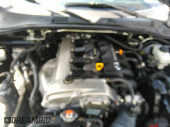 2021 Mazda MX-5 Miata Grand Touring z VIN JM1NDAM75M0451597, wystawiony jako IAAI lot #41932712 z przebiegiem 61 710 mil mil oraz . Historia ofert i sprzedaży dostępna na DreamBid. Obrazek 10.