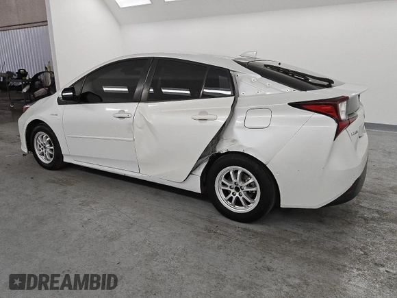 2021 Toyota Prius L Eco with VIN JTDKAMFU3M3141253, listed as a Copart auction lot 45244345 with 183,396 mi miles and Clean Title. Bid and sale history available at DreamBid. Image 2.
