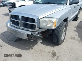 2007 Dodge Dakota SLT with VIN 1D7HE48K57S147503, listed as a IAAI auction lot 41858271 with 242,534 mi miles and . Bid and sale history available at DreamBid. Image 6.