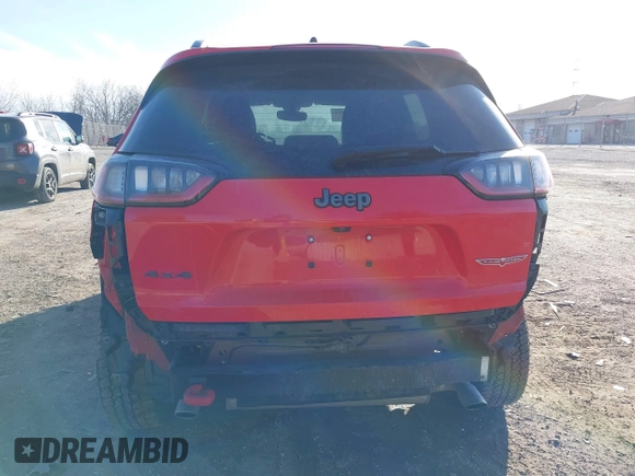 2019 Jeep Cherokee Trailhawk Elite with VIN 1C4PJMBX3KD217437, listed as a IAAI auction lot 41448614 with 85,889 mi miles. Bid and sale history available at carsss.com. Image 21.