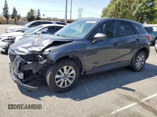 2014 Mazda CX-5 Sport z VIN JM3KE2BEXE0309035, wystawiony jako Copart lot #51688495 z przebiegiem 156 661 mil mil oraz Szkoda całkowita • Salvage title. Historia ofert i sprzedaży dostępna na DreamBid. Obrazek 1.